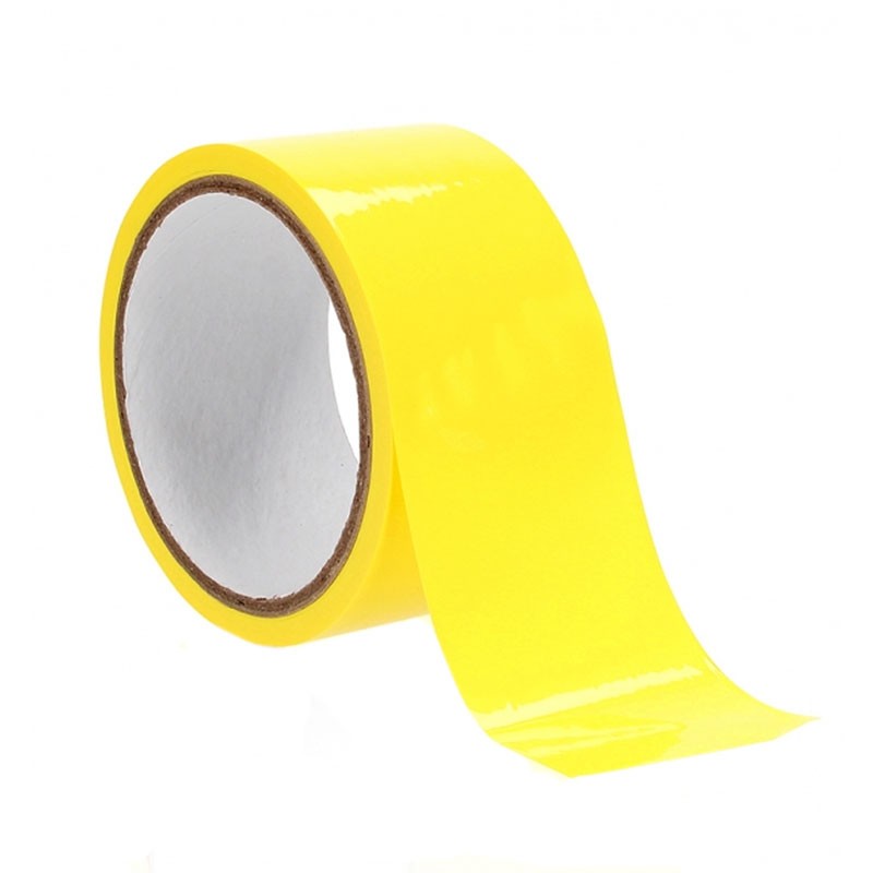 Rouleau de film BDSM 17.5 m (jaune) - Ouch ! Xtreme Bondage Tape