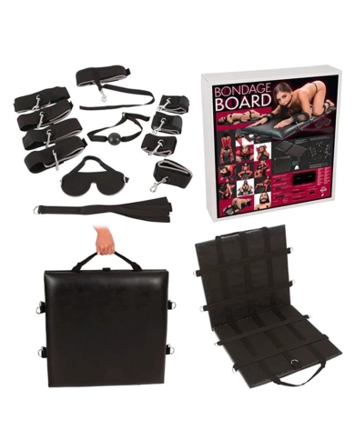 Tavola per il bondage con legami e accessori BDSM Tavola per il bondage con legami e accessori BDSM